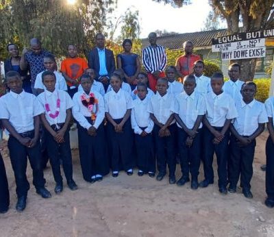 OVC , USAID Kizazi Kipya staff and FDC teachers during graduation ceremony
